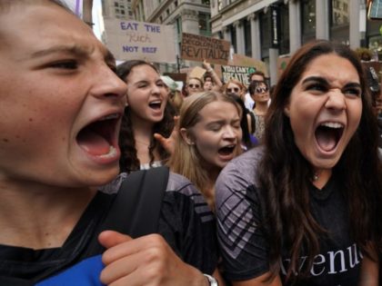 TOPSHOT - Students participate in the Global Climate Strike march on September 20, 2019 in New York City. - Crowds of children skipped school to join a global strike against climate change, heeding the rallying cry of teen activist Greta Thunberg and demanding adults act to stop environmental disaster. It …