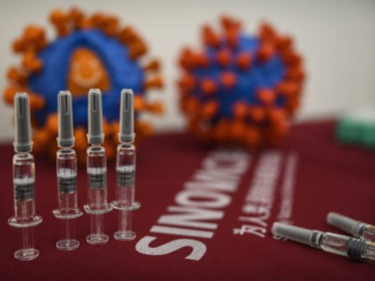 BEIJING, CHINA - SEPTEMBER 24: Syringes of the potential COVID-19 vaccine CoronaVac are seen on a table at Sinovac Biotech where the company is producing their potential COVID-19 vaccine CoronaVac during a media tour on September 24, 2020 in Beijing, China. Sinovacs inactivated vaccine candidate, called CoronaVac, is among a …
