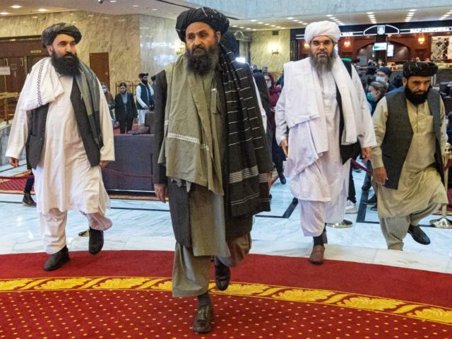 Taliban co-founder Mullah Abdul Ghani Baradar (C) and other members of the Taliban delegat
