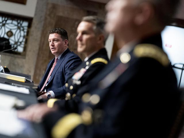 From left, Acting Assistant Secretary Of Defense For Special Operations And Low-Intensity Conflict Christopher Maier, accompanied by Special Operations Command Gen. Richard Clarke, U.S. Cyber Command Commander, National Security Agency Director and Central Security Service Chief, Gen. Paul Nakasone, speaks at a hearing to examine United States Special Operations Command and United States Cyber Command in review of the Defense Authorization Request for fiscal year 2022 and the Future Years Defense Program, on Capitol Hill on March 25, 2021 in Washington, DC. (Photo by Andrew Harnik-Pool/Getty Images)