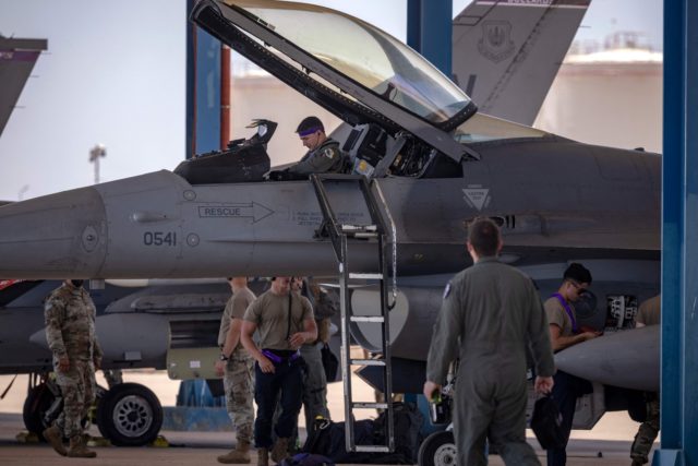 A US Air Force personnel prepares to disembark after landing at an airbase in Ben Guerir,