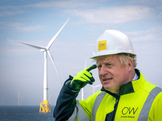 Britain's Prime Minister Boris Johnson gestures onboard the Esvagt Alba during a visit to the Moray Offshore Windfarm East, off the Aberdeenshire coast on August 5, 2021, the second day of his two-day visit to Scotland. (Photo by Jane Barlow / POOL / AFP) (Photo by JANE BARLOW/POOL/AFP via Getty ...