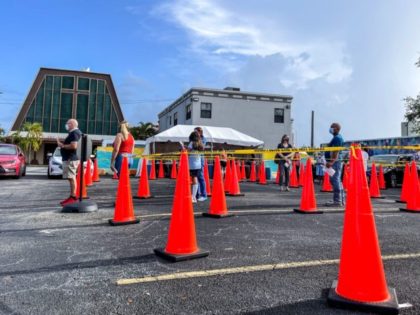 People line up for Covid-19 testing in Miami, on September 1, 2021. (Photo by CHANDAN KHAN