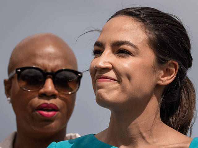 (L-R) Rep. Ayanna Pressley (D-MA) and Rep. Alexandria Ocasio-Cortez (D-NY) attend a news c