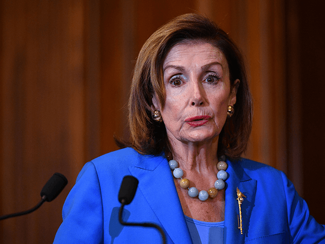 Speaker of the US House of Representatives Nancy Pelosi speaks before signing a bill to fund the US government avoiding a federal shutdown at the US Capitol in Washington, DC on September 30, 2021. - The US Congress approved a stopgap funding bill Thursday in a rare show of cross-party unity to keep federal agencies running past the end of the fiscal year and avert a government shutdown. (Photo by Mandel NGAN / AFP) (Photo by MANDEL NGAN/AFP via Getty Images)