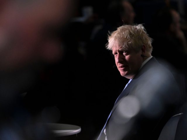 Britain's Prime Minister Boris Johnson sits for a broadcast media interview on the third day of the annual Conservative Party Conference at the Manchester Central convention centre in Manchester, northwest England, on October 5, 2021. (Photo by Paul ELLIS / AFP) (Photo by PAUL ELLIS/AFP via Getty Images)