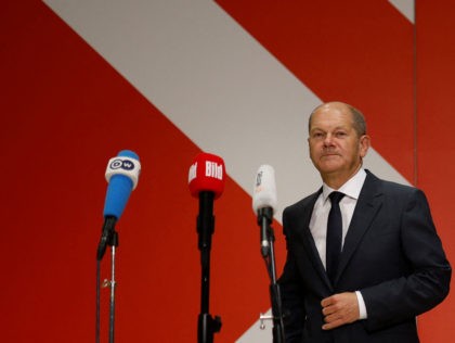 German Finance Minister, Vice-Chancellor and the Social Democratic SPD Party's candidate for chancellor Olaf Scholz arrives to give a press statement at the headquarters of the SPD in Berlin, on October 6, 2021. - Social Democrats, Greens and German Liberals will begin preliminary discussions on October 7, 2021 in an …