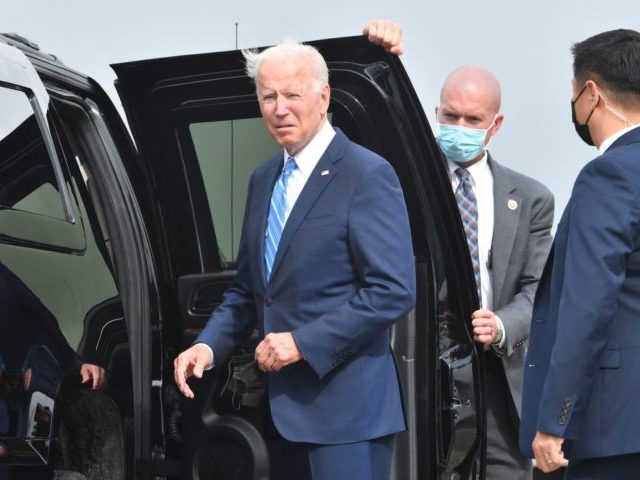 US President Joe Biden looks on after arriving on Airforce One at Chicago OHare Internatio