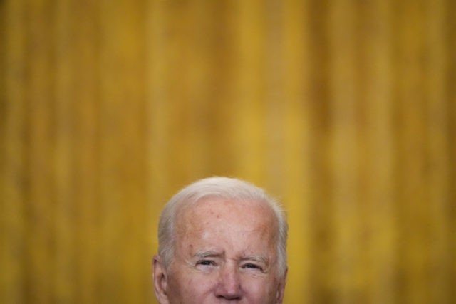 WASHINGTON, DC - OCTOBER 13: U.S. President Joe Biden speaks about supply chain bottlenecks in the East Room the White House October 13, 2021 in Washington, DC. With the holiday season approaching, President Biden announced that the Port of Los Angeles will begin to operate 24 hours a day in …