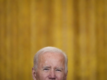 WASHINGTON, DC - OCTOBER 13: U.S. President Joe Biden speaks about supply chain bottlenecks in the East Room the White House October 13, 2021 in Washington, DC. With the holiday season approaching, President Biden announced that the Port of Los Angeles will begin to operate 24 hours a day in …