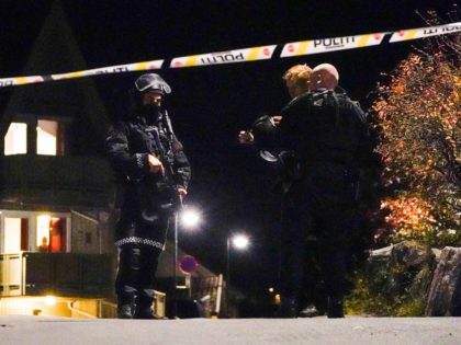 Police officers cordon off the scene where they are investigating in Kongsberg, Norway after a man armed with bow killed several people before he was arrested by police on October 13, 2021. - A man armed with a bow and arrows killed several people and wounded others in the southeastern …
