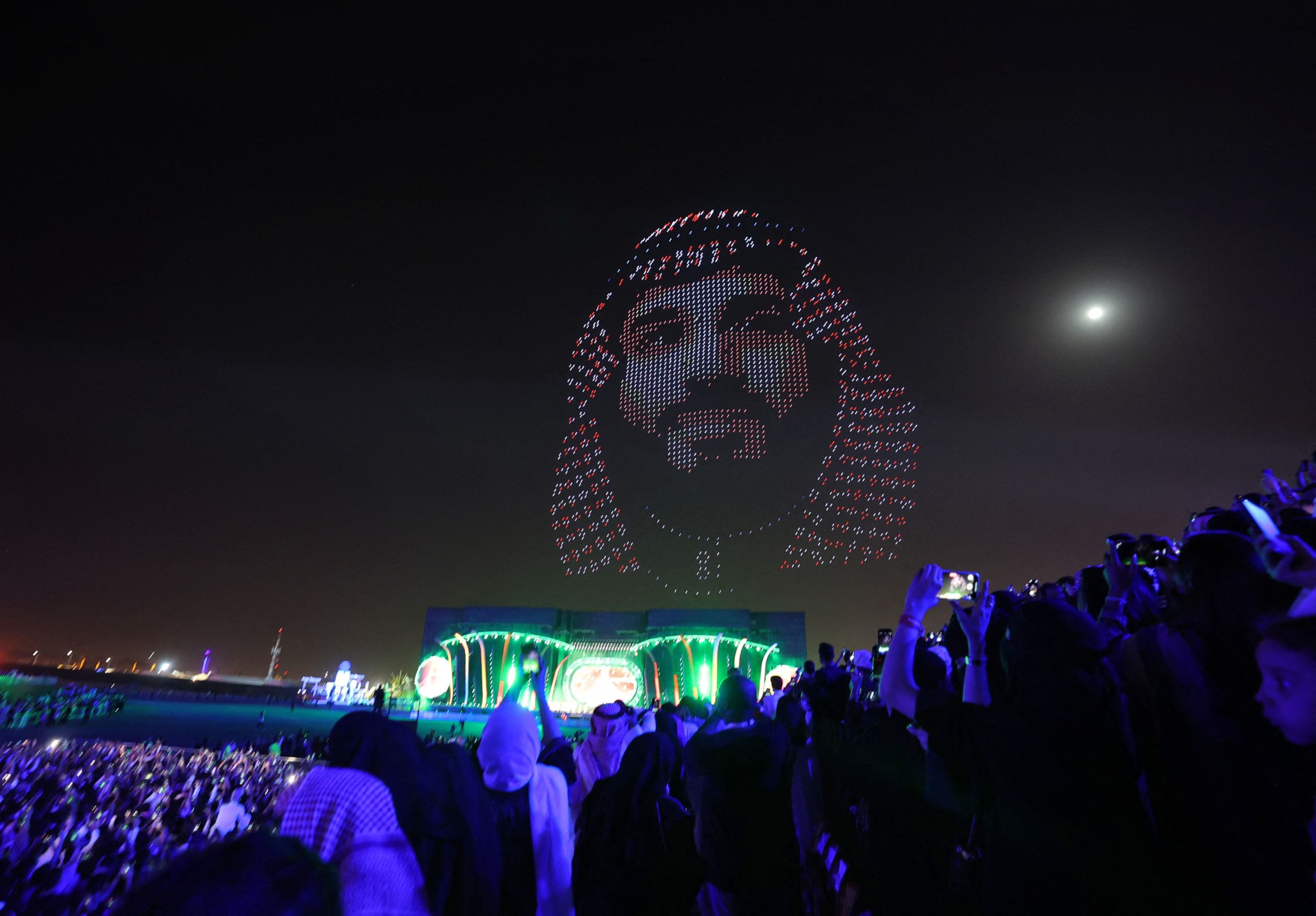 An image of Saudi crown prince Mohammed bin Salman is displayed on the opening night of the Riyadh Season festivities in the Saudi capital late on October 20, 2021. - The arts and culture festival began yesterday and runs until March 2022 in Riyadh. (Photo by Fayez Nureldine / AFP) (Photo by FAYEZ NURELDINE/AFP via Getty Images)