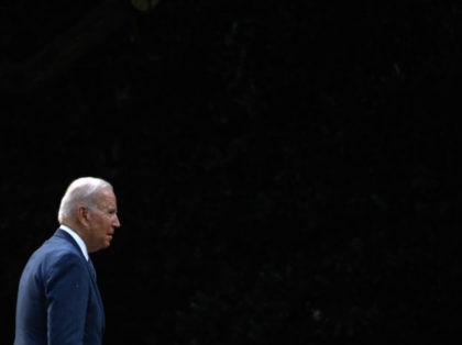 US President Joe Biden walks to the Oval Office upon return to the White House in Washingt