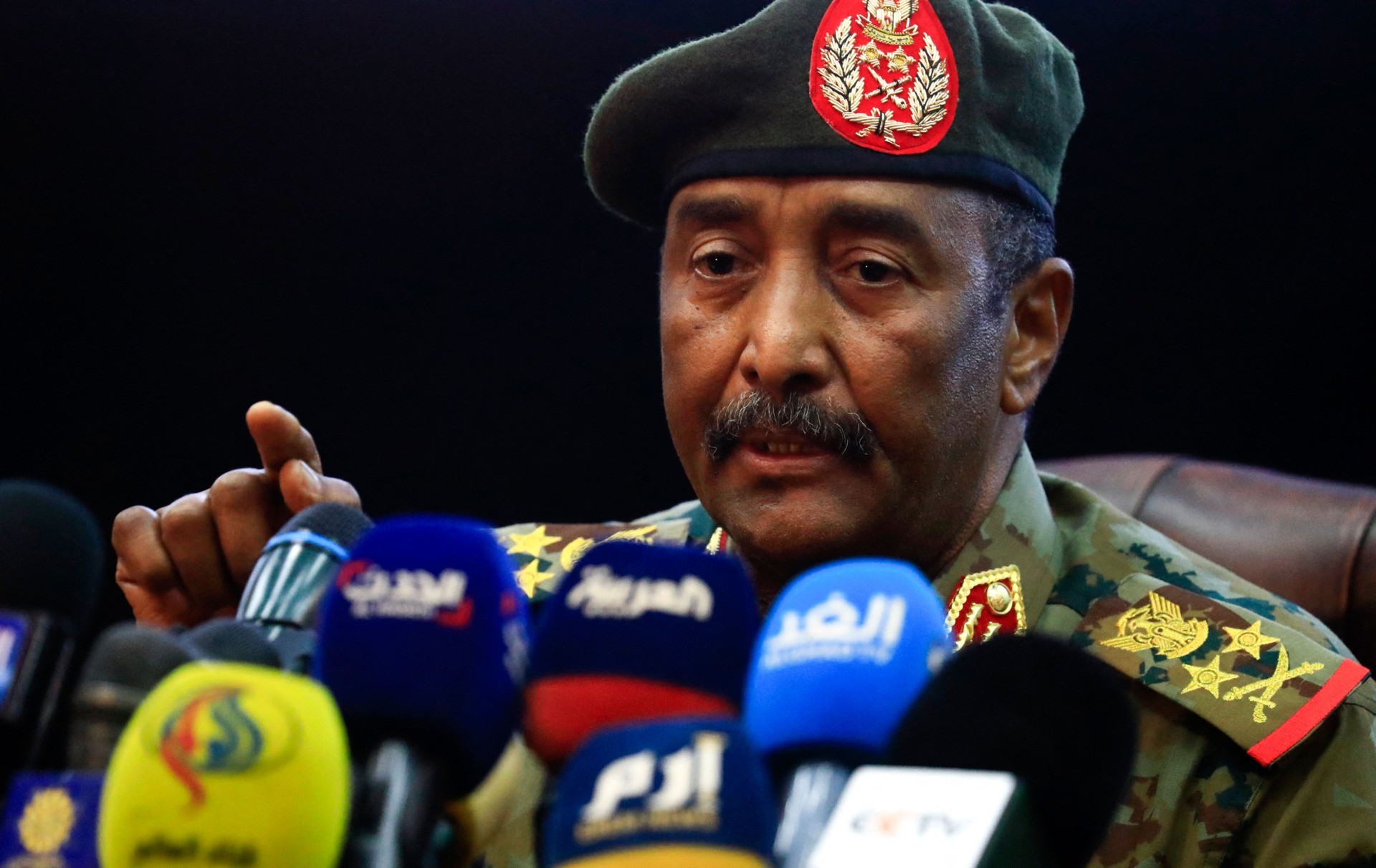 Sudan's top army general Abdel Fattah al-Burhan holds a press conference at the General Command of the Armed Forces in Khartoum on October 26, 2021. - Angry Sudanese stood their ground in street protests against a coup, as international condemnation of the military's takeover poured in ahead of a UN Security Council meeting. (Photo by ASHRAF SHAZLY / AFP) (Photo by ASHRAF SHAZLY/AFP via Getty Images)