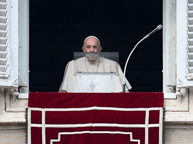 Pope Francis arrives at the window of the apostolic palace to deliver the weekly Angelus prayer on October 31, 2021 in The Vatican. (Photo by Vincenzo PINTO / AFP) (Photo by VINCENZO PINTO/AFP via Getty Images)