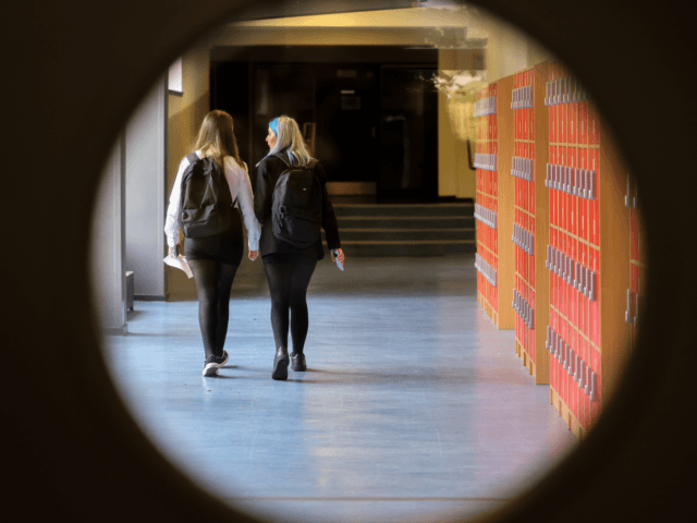 GLASGOW, SCOTLAND - AUGUST 12: Pupils return to St Paul's High School for the first time since the start of the coronavirus lockdown nearly five months ago on August 12, 2020 in Glasgow, Scotland. Pupils will return to more of Scotland's schools today, as the fallout continues from the government’s …