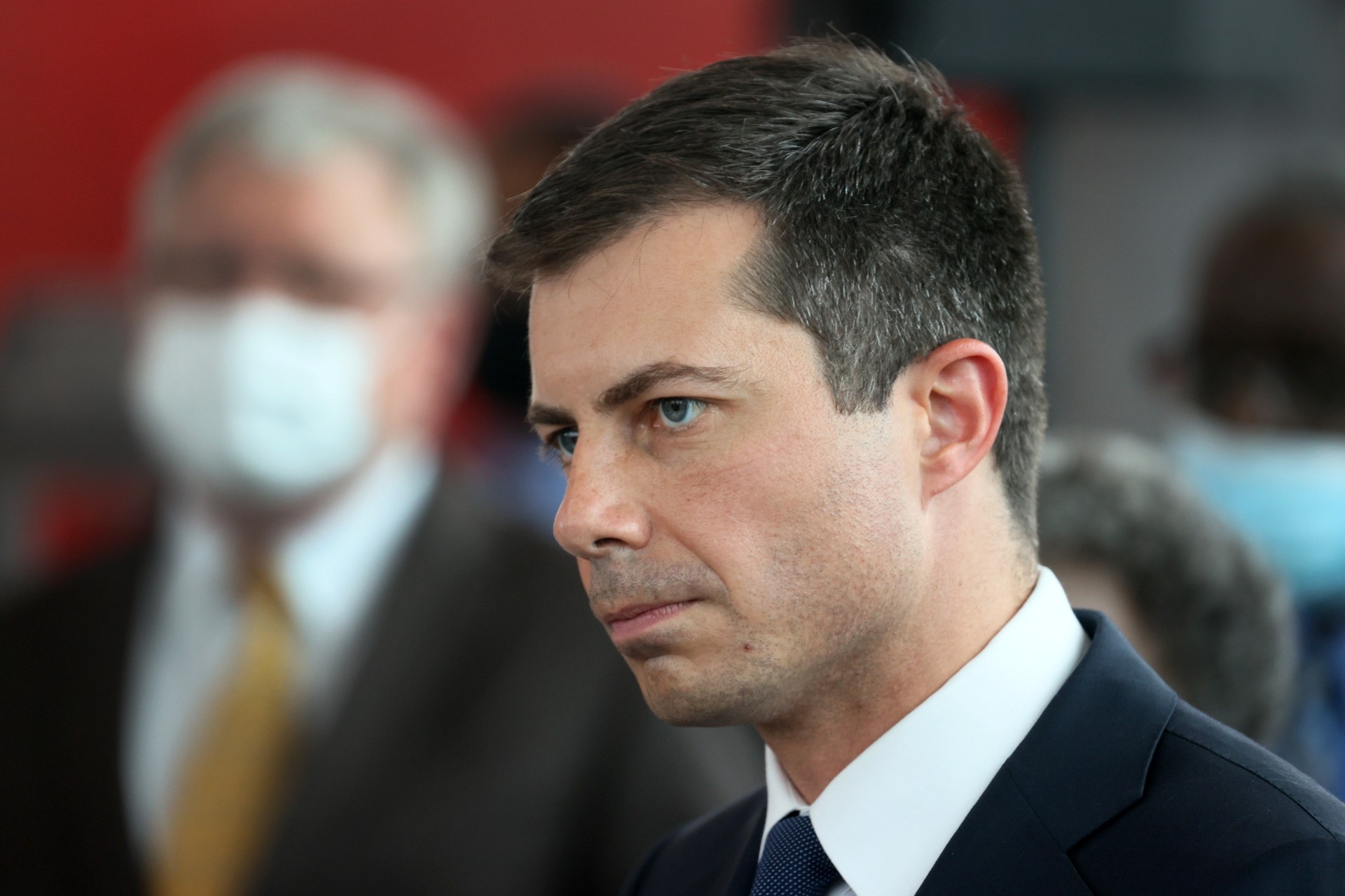 CHICAGO, ILLINOIS - JULY 16: Transportation Secretary Pete Buttigieg listens to a question during a press conference following a tour of a Southside transportation hub on July 16, 2021 in Chicago, Illinois. Buttigieg was in town to rally support for President Biden’s $1.2 trillion roads and bridges infrastructure plan. (Photo by Scott Olson/Getty Images)