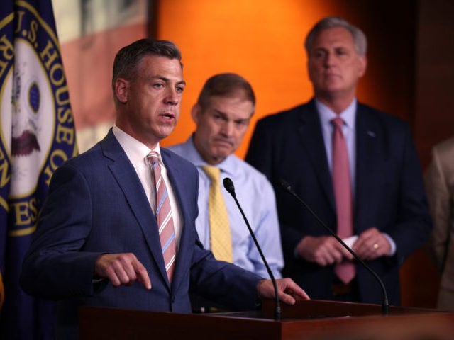 WASHINGTON, DC - JULY 21: Rep. Jim Banks (R-IN) (L), joined by Rep. Jim Jordan (R-ON) (C)