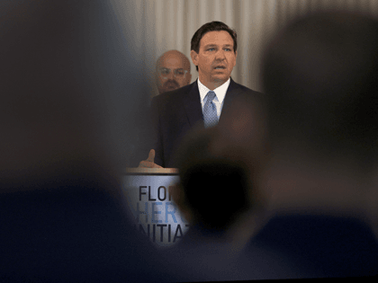 Florida Gov. Ron DeSantis speaks during an event to give out bonuses to first responders held at the Grand Beach Hotel Surfside on August 10, 2021 in Surfside, Florida. DeSantis gave out some of the $1,000 checks that the Florida state budget passed for both first responders and teachers across …