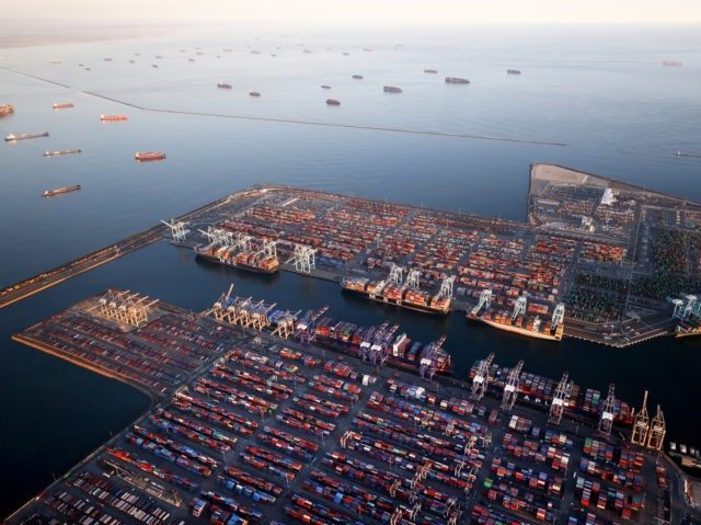 LOS ANGELES, CALIFORNIA – SEPTEMBER 20: In an aerial view, container ships (Top L) are a