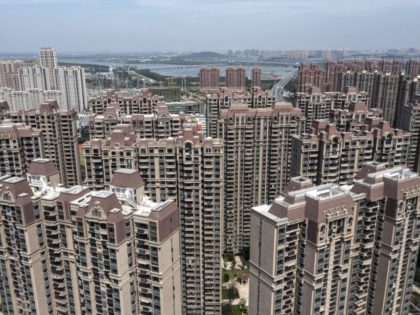 WUHAN, CHINA - SEPTEMBER 26: (CHINA OUT) An aerial view shows the Evergrande Changqing community on September 26, 2021 in Wuhan, Hubei Province, China. In 2015, Evergrande real estate acquired four super large projects in Haikou, Wuhan and Huizhou, with a total construction area of nearly 4 million square meters …