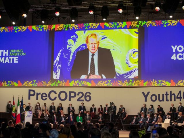 MILAN, ITALY - SEPTEMBER 30: Boris Johnson UK Prime Minister speaks on video conference during the Pre-COP26 on September 30, 2021 in Milan, Italy. On the final day of the pre-COP26 climate change summit in Milan, some 400 young activists from 180 countries met for thematic working groups before addressing ...