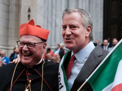 New York Mayor Bill de Blasio joins New York Cardinal Timothy Dolan during the annual Columbus Day Parade in Manhattan after it was canceled last year due to the pandemic on October 11, 2021 in New York City. Hundreds of people cheered from the sidewalks as local politicians, high school …