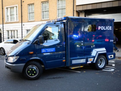 LONDON, ENGLAND - OCTOBER 21: An armoured police van departs from Westminster Magistrates