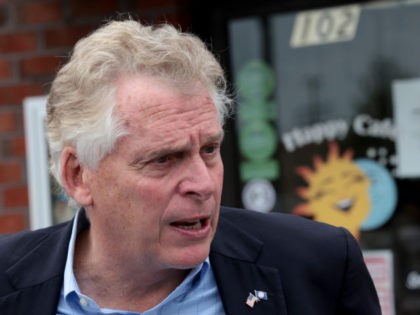 VIRGINIA BEACH, VIRGINIA - OCTOBER 25: Democratic gubernatorial candidate, former Virginia Gov. Terry McAuliffe answers questions from reporters after speaking during a campaign event where he received the endorsement of the Virginia Beach African American Political Action Council at The Happy Cafe on October 25, 2021 in Virginia Beach, Virginia. …