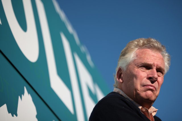 NORFOLK, VIRGINIA - OCTOBER 30: Democratic gubernatorial candidate, former Virginia Gov. Terry McAuliffe waits to speak while campaigning at the Iron Workers Local Union 79 October 30, 2021 in Norfolk, Virginia. The Virginia gubernatorial election, pitting McAuliffe against Republican candidate Glenn Youngkin, is November 2. (Photo by Win McNamee/Getty Images)
