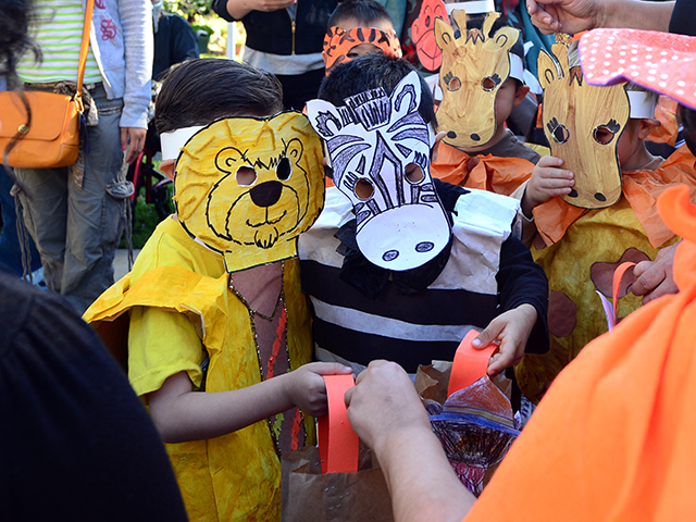 Children dressed as zoo animals from Happy Day School in Monterey Park, California, celebr