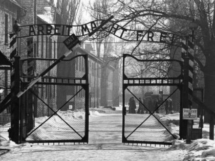 The gates of the Nazi concentration camp at Auschwitz, Poland, circa 1965. The sign above them is 'Arbeit Macht Frei' - 'Work Makes You Free'. (Photo by Keystone/GettyImages)