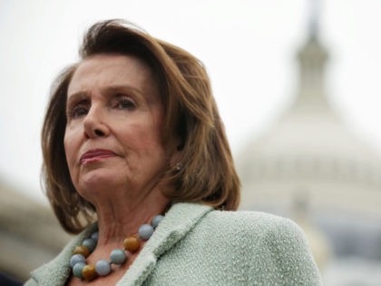 WASHINGTON, DC - APRIL 21: U.S. House Minority Leader Rep. Nancy Pelosi (D-CA) listens dur