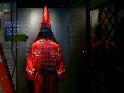 WASHINGTON, DC - SEPTEMBER 14: Robes belonging a member of the Ku Klux Klan are on display in the concourse galleries at the Smithsonian's National Museum of African American History and Culture on the National Mall September 14, 2016 in Washington, DC. Filled with exhibits and artifacts telling the story …