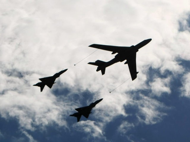 BEIJING - OCTOBER 01: Planes from the Chinese People's Liberation Army air force fly in fo