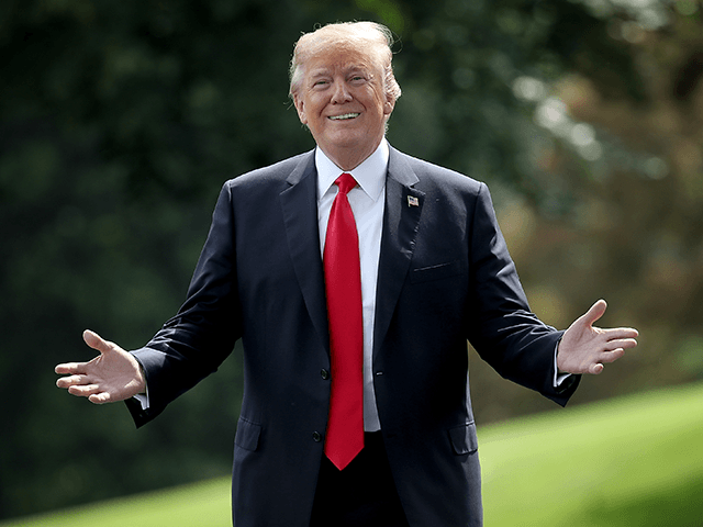 U.S. President Donald Trump gestures toward journalists shouting questions as he departs the White House May 29, 2018 in Washington, DC. Trump is scheduled to travel to Nashville, Tennessee later today for a campaign rally. (Photo by Win McNamee/Getty Images)