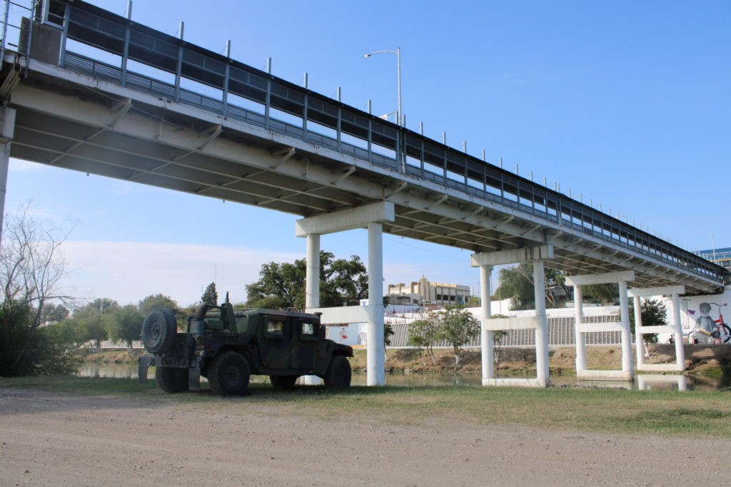 Texas National Guard troops park along the Rio Grande under the Eagle Pass Port of Entry. (Photo: Randy Clark/Breitbart Texas)