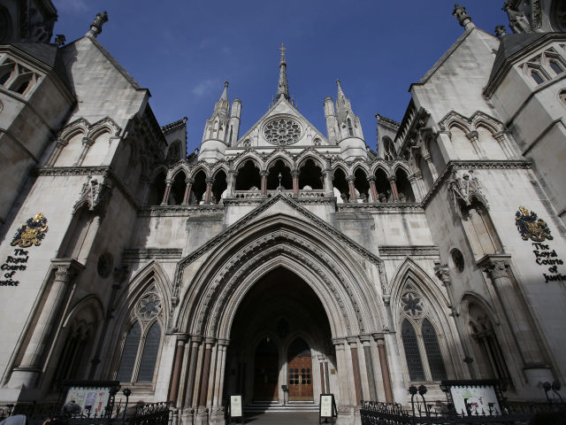 The Royal Courts of Justice building, which houses the High Court of England and Wales, is pictured in London on February 3, 2017. / AFP / Daniel LEAL-OLIVAS (Photo credit should read DANIEL LEAL-OLIVAS/AFP via Getty Images)