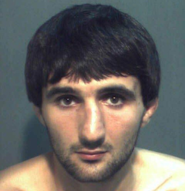 In this booking photo provided by the Orange County Sheriff's Office, Ibragim Todashev poses for his mug shot after being arrested for aggravated battery May 4, 2013 in Orlando, Florida. (Orange County Sheriff's Office via Getty Images)