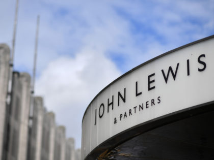 A sign is displayed outside the John Lewis store in Oxford Street, central London on July