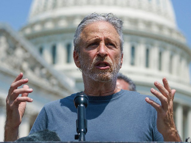 Entertainer and activist Jon Stewart lends his support to House Veterans Affairs Committee Chair Mark Takano, D-Calif., as lawmakers work on legislation to expand benefits and improve care for veterans suffering from toxic exposure to burn pits and other hazards, at the Capitol in Washington, Wednesday, May 26, 2021. (AP …