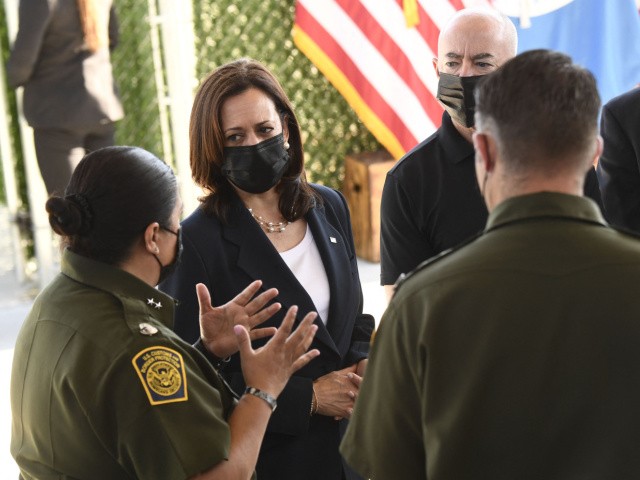 US Vice President Kamala Harris (2nd-L) tours the El Paso Border Patrol Station, on June 25, 2021 in El Paso, Texas. - Vice President Kamala Harris is traveling in El Paso, Texas on Friday, where she will tour a Customs and Border Protection processing facility, meeting with advocates and NGOs. (Photo by Patrick T. FALLON / AFP) (Photo by PATRICK T. FALLON/AFP via Getty Images)