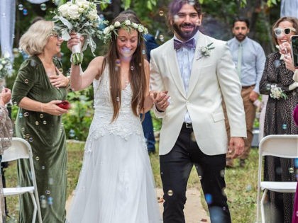 A bride surprised her blind groom with a tactile wedding dress comprised of multiple textures that brought her groom to tears.