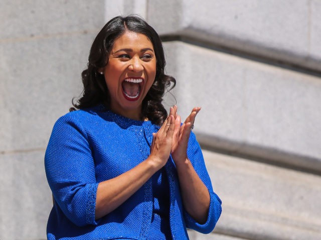San Francisco Mayor London Breed smiles at the crowd before her inauguration outside City Hall, Wednesday, July 11, 2018, in San Francisco. Breed, the first African-American female mayor of San Francisco, made history as she took the oath of office, vowing to help drug users and the homeless in a …