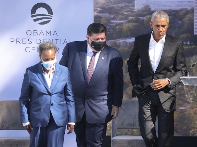 Gov. J.B. Pritzker (D-IL) and Chicago Mayor Lori Lightfoot (D) join former U.S. President Barack Obama during a ceremonial groundbreaking at the Obama Presidential Center in Jackson Park on September 28, 2021 in Chicago, Illinois. (Scott Olson/Getty Images)