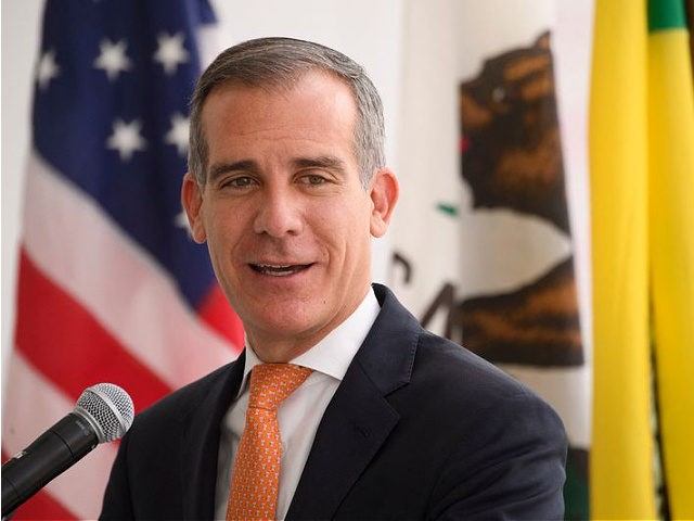 Los Angeles Mayor Eric Garcetti speaks during the opening of the Terminal 1 expansion at Los Angeles International Airport (LAX) on June 4, 2021 in Los Angeles, California. - - The terminal expansion is part of a $477.5 million infrastructure project to expand passenger capacity including security screening, baggage, and …