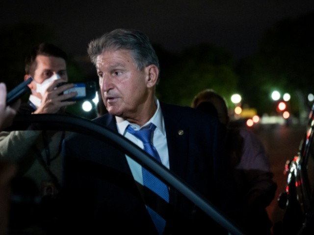 WASHINGTON, DC - SEPTEMBER 30: Sen. Joe Manchin (D-WV) exits the U.S. Capitol after meeting with White House officials September 30, 2021 in Washington, DC. Manchin has stated that he will not support a social policy spending package that goes over $1.5 trillion, at odds with the $3.5 trillion package supported by more liberal Democrats. (Photo by Drew Angerer/Getty Images)