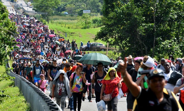 Migrants heading in a caravan to the US, walk towards Mexico City to request asylum and re