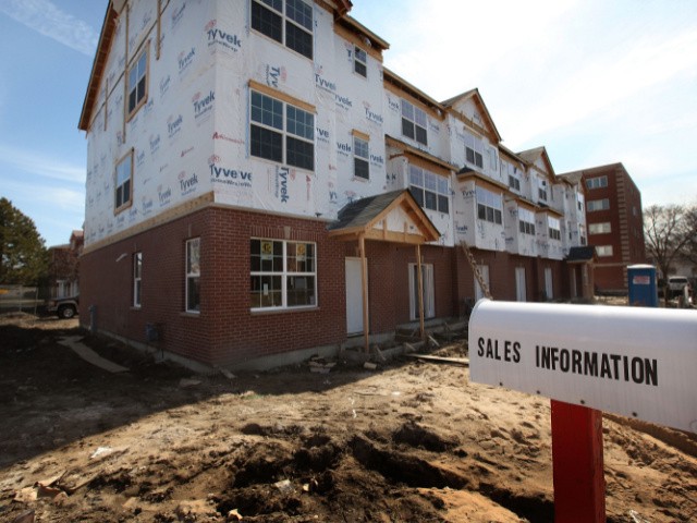DES PLAINES, IL - MARCH 16: A multi-family condominium project is under construction on March 16, 2011 in Des Plaines, Illinois. Request for building permits in February, a leading indicator for the strength of the housing industry, fell 8.2%, to a seasonally adjusted 517,000 units, a record low. Single-family home construction starts dipped nearly 12% in the same month and multi-family starts fell 46%. (Photo by Scott Olson/Getty Images
