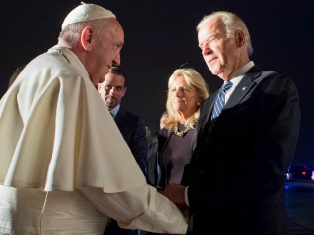 In this Sunday, Sept. 27, 2015 Vice President Joe Biden, right, and his wife Jill Biden, center, say goodbye to Pope Francis as he prepares to depart Philadelphia International Airport, in Philadelphia, on his way back to the Vatican. (L'Osservatore Romano/Pool Photo via AP)